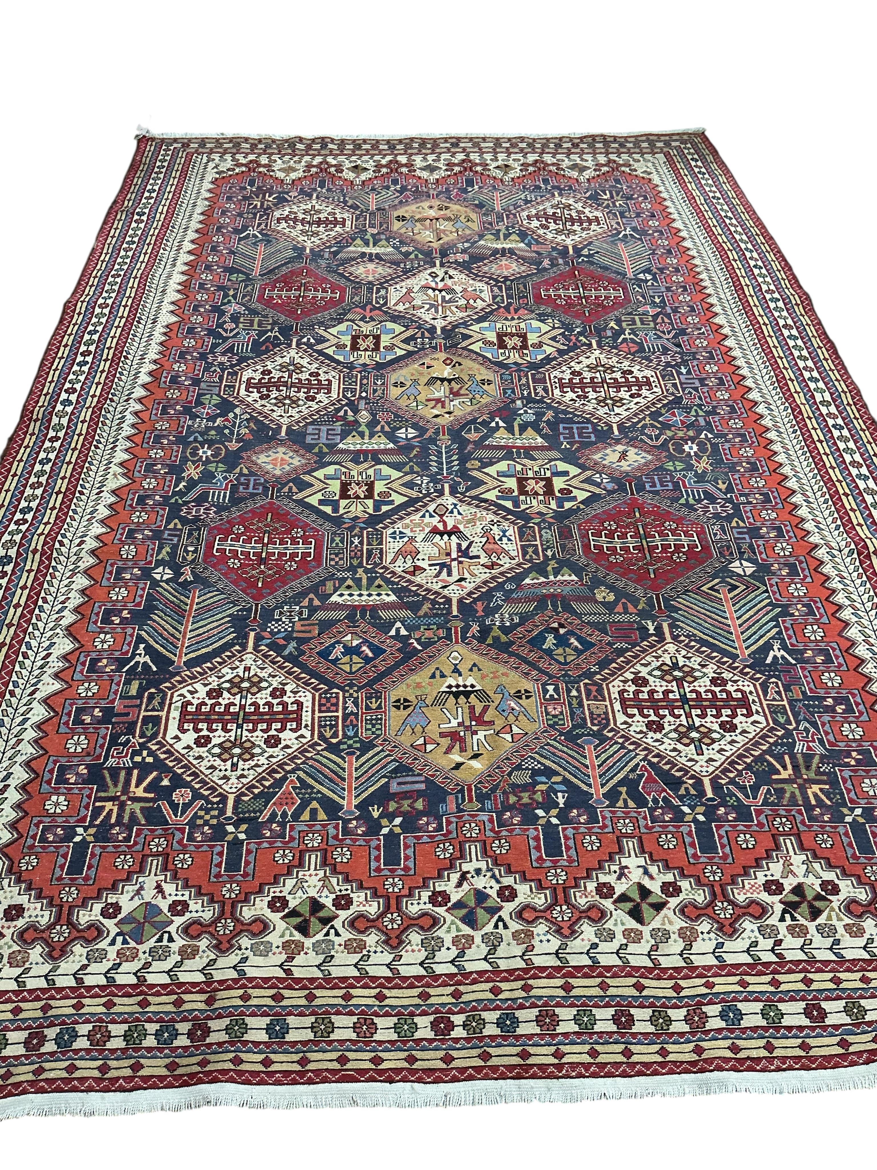 A Soumak blue ground carpet, 300 x 200cm